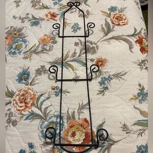 Wrought iron plate holder